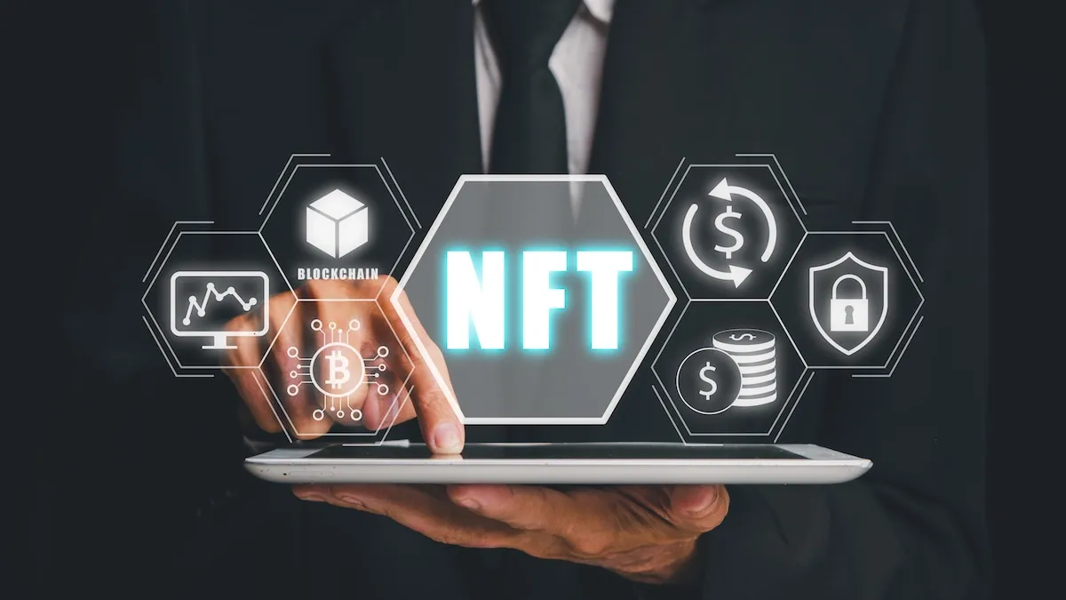 nft-token-digital-crypto-art-blockchain-technology-concept-person-hand-using-digital-tablet-with-nft-icon-virtual-screen